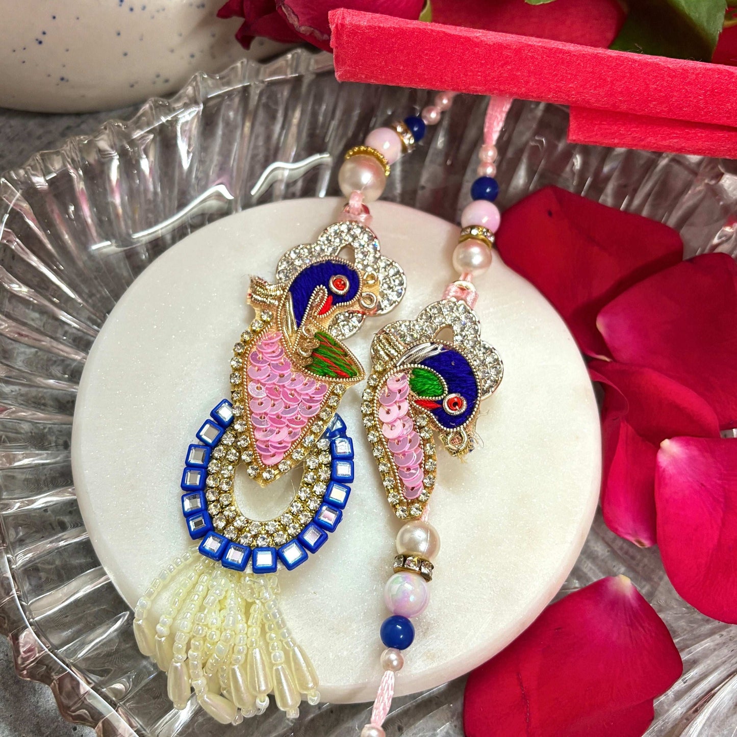 Handmade Peacock Rakhi Set for brother with colorful embellishments and intricate design