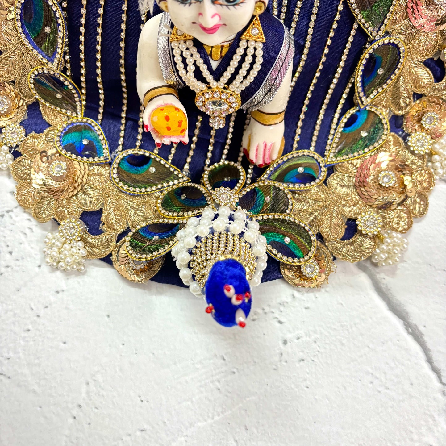 Laddu Gopal Poshak Tyohaarvibe with intricate navy blue design and decorative embellishments