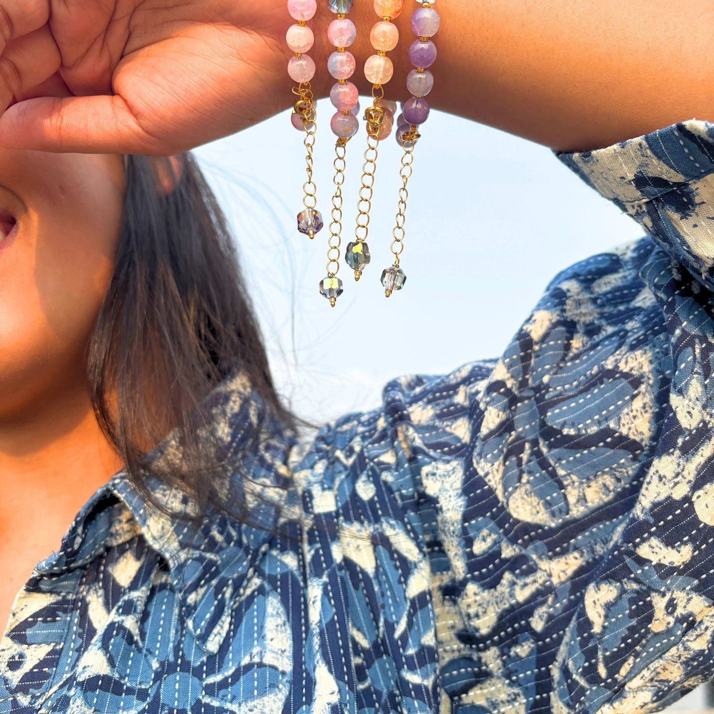 TyohaarVibe Marble Effect Beaded Bracelet Combo displayed on a smiling person's wrist